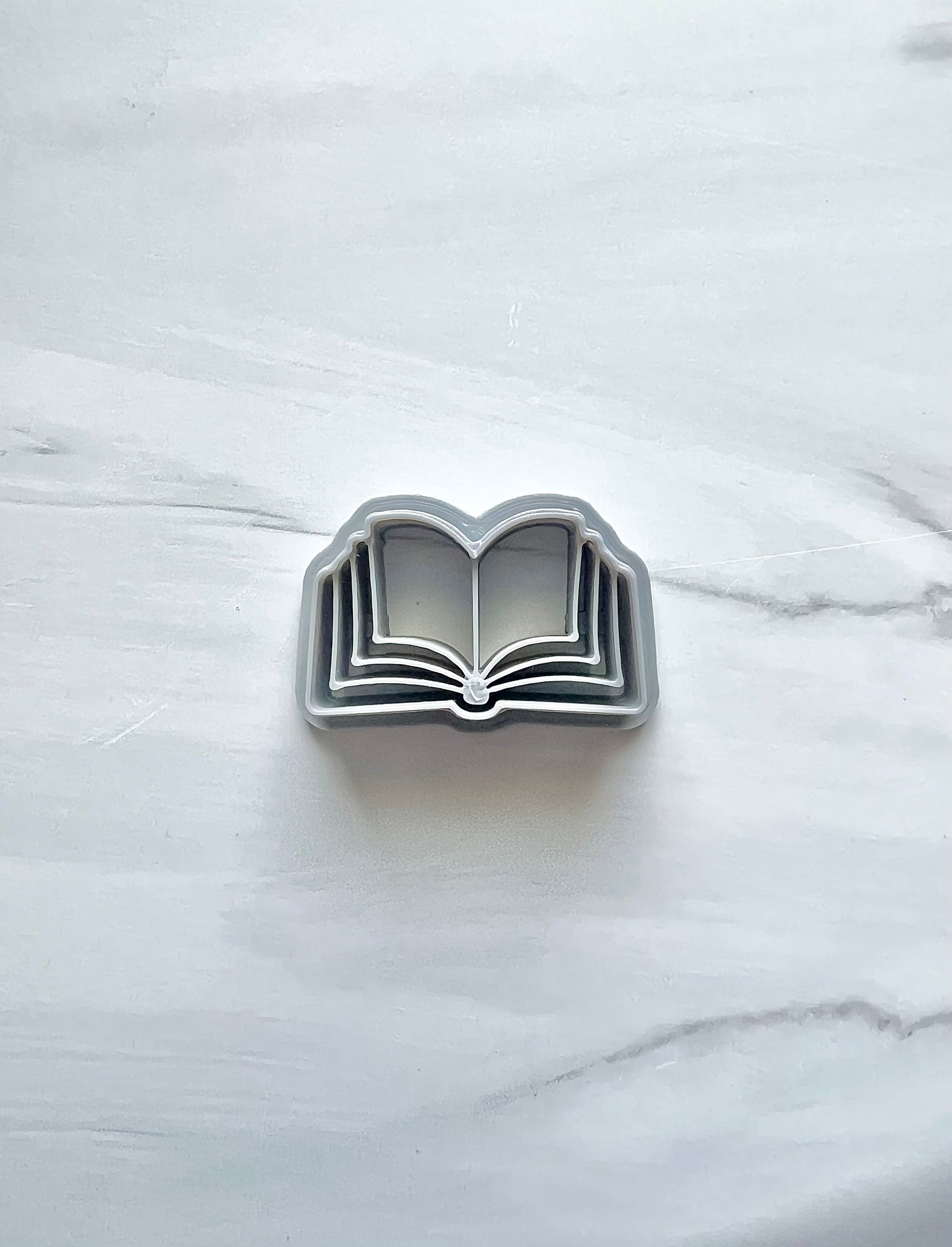 Open Book Cutter